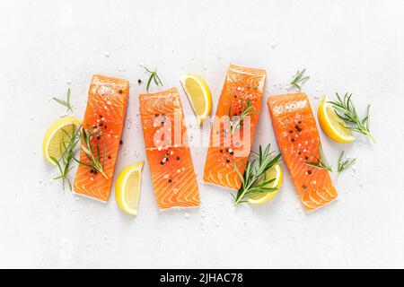 Salmon. Fresh raw salmon fish fillet on white background Stock Photo