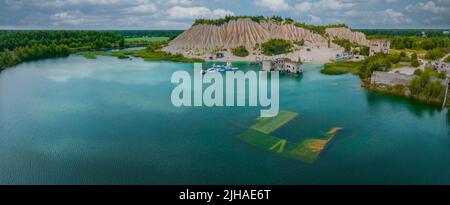 Abandoned quarry for extraction of limestone. Beautiful nature, attraction in Estonia. Stock Photo