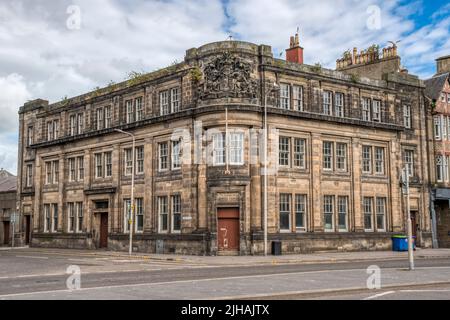 The early 20th century Grade B listed former Department for Work and Pensions JobCentre building in Dundee on corner of Dock Street & Gellatly Street. Stock Photo
