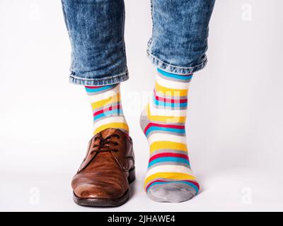 One striped sock in yellow, orange, white, red-haired brown stripes. 5  colors. isolated Stock Photo - Alamy