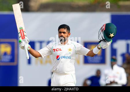 Galle, Sri Lanka. 17th July 2022. Pakistan's captain Babar Azam celebrates after scoring a century (100 runs) during the 2nd day of the 1st test cricket match between Sri Lanka vs Pakistan at the Galle International Cricket Stadium in Galle on 17th July, 2022. Viraj Kothalwala/Alamy Live News Stock Photo