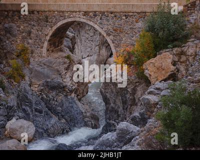 travel to Turkey, Kemer in autumn seasone. ancient Roman bridge over a shady mountain gorge in the Kesme Bogazi canyon, Turkey Stock Photo