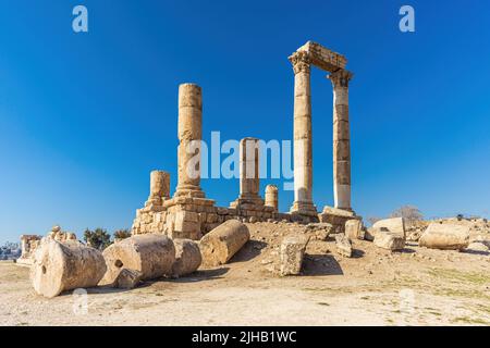 Roman ruins in the middle of the ancient citadel park in the center of Amman, Jordan Stock Photo