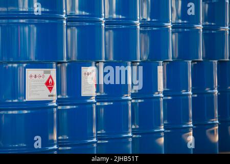 Oil barrels green or symbol warning chemical drums vertical stacked up. Stock Photo