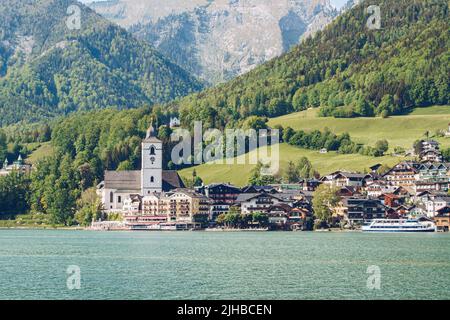 St. Wolfgang at the famous lake Wolfgangsee in Salzkammergut, Austria. View from the lake to the touristic travel destination.