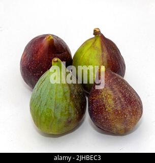 Fresh organic green and purple figs isolated on white background Stock Photo
