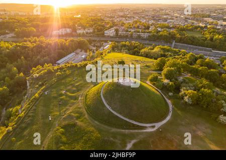 Aerial view of the Krakus Mound with sunset view of the Krakow old town, Poland Stock Photo