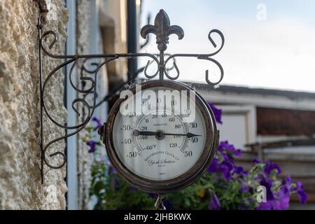 July 2022 Heatwave, Hampshire, England, UK. A garden thermometer shows the temperature is in the high 30s degrees C, (100 F), extreme heat warning Stock Photo