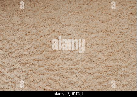 Woven brown color rug texture flat fluffy surface Stock Photo