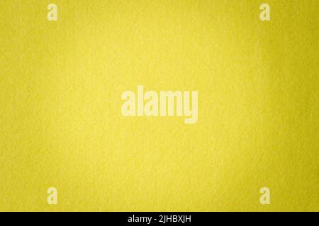 Yellow color felt textile fabric texture background Stock Photo