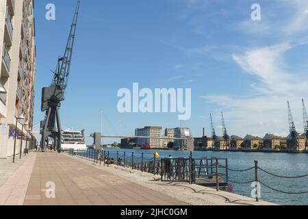 Wharfside - Royal Victoria Dock with views across the dock, and showing the Sunborn London Yacht Hotel. Stock Photo