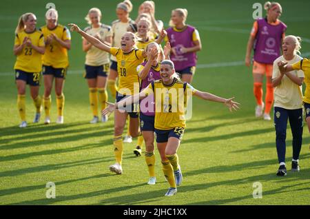 Sweden's Olivia Schough celebrates with team-mates at the end of the game after winning the group following the UEFA Women's Euro 2022 Group C match at Leigh Sports Village, Wigan. Picture date: Sunday July 17, 2022. Stock Photo