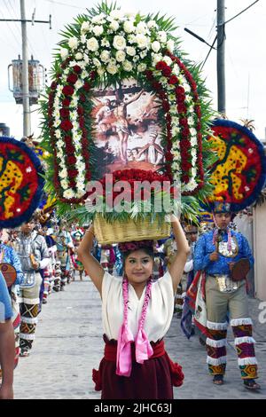 Dancers in procession during the Precious Blood of Christ festival in Teotitlán del Valle, Oaxaca, Mexico Stock Photo