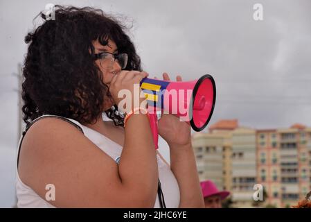 Cocoa, Brevard County, Florida. USA. July 16, 2022. A group held a protest rally in support of woman's rights at a riverfront park in Cocoa Village then walked through the streets to the US1 major intersection to wave signs and shout slogans to passing motorists. Credit: Julian Leek/Alamy Live News Stock Photo