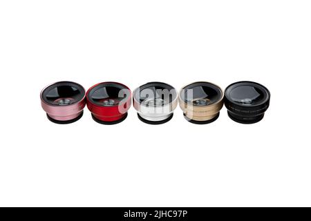 Sets of additional wide-angle and macro lenses for the phone. Smartphone lenses. Isolate on a white background. Stock Photo
