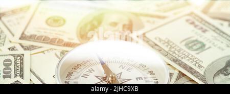 Travel compass on the background of American dollars. Travel concept, travel cost Stock Photo