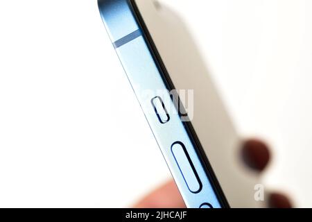 Close up of iphone's silent button isolated on white background Stock Photo