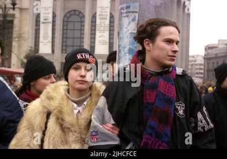 Bucharest, Romania, January 22, 1999. A young couple participating in a social and political march for democracy ('Mars pentru Democratie') organized by the Civic Alliance Foundation. Stock Photo