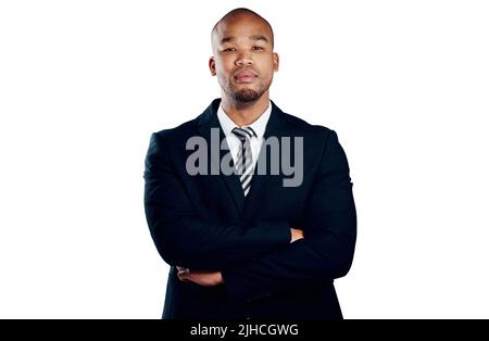 The picturesque of white collar success. Studio shot of a handsome young businessman posing against a white background. Stock Photo