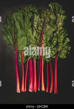 Swiss Chard on a dark surface Stock Photo