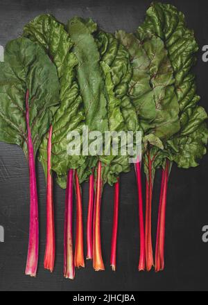 Swiss Chard on a dark surface Stock Photo