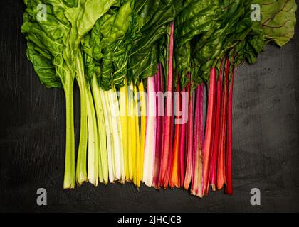 Swiss Chard on a dark surface Stock Photo