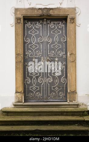 Entrance door at a religious architectural building, Prague Castle district, Prague, Czech Republic. Stock Photo