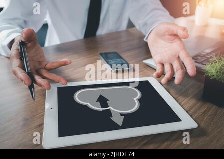 Businessman hand using digital tablet with cloud computing icon, Cloud computing concept, Backup Storage Data Internet, networking and digital, Share Stock Photo