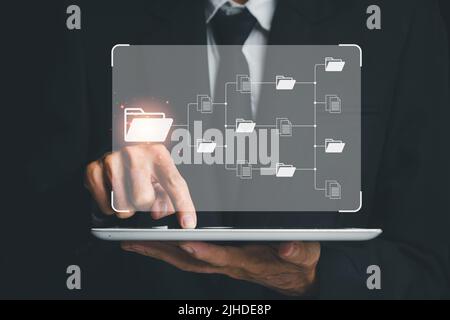 Document management system concept, Businessman working on digital tablet document management system (DMS), Virtual online documentation database and Stock Photo