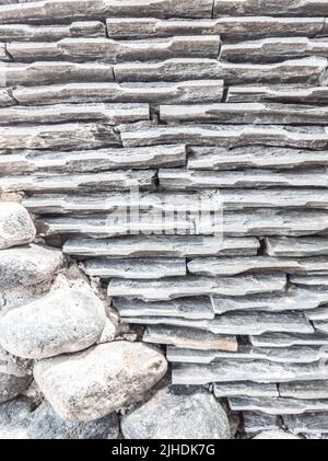 VERTICAL Decor stone brick wall texture, siding horizontal lines different sized shapes. Beautiful nature wallpaper. Romantic simple. Abstract grunge Stock Photo