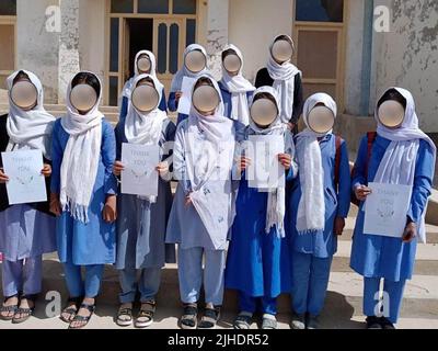 EDITORS NOTE IMAGE REDACTED AT SOURCE Undated handout photo girls being supported through the Buddy Box in Afghanistan - their faces have been blurred to protect their identity. Issue date: Monday July 18, 2022. Stock Photo