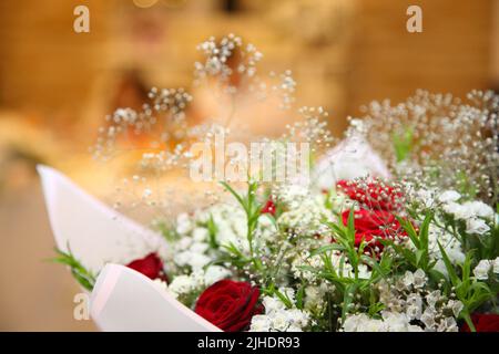 Table setting in a restaurant. Table setting with glasses, cutlery and plates. Restaurant interior. Stock Photo