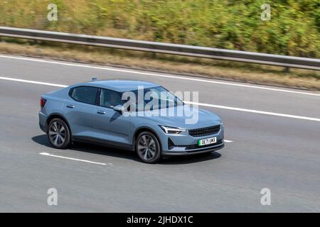 2022 five-door hatchback electric car Volvo POLESTAR 2 EV FWD Electricity, fully Electric 5-Door hatchback. Polestar 2 advanced electric motor driving on the M6 motorway UK Stock Photo