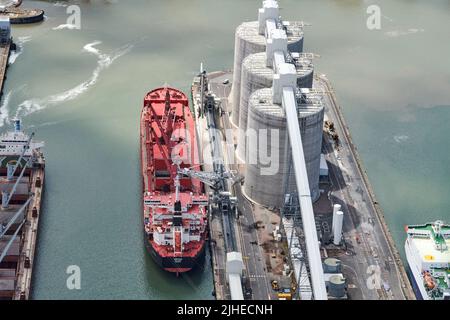 An aerial view of a ship unloading atSeaforth Docks, Liverpool, Merseyside, north West England, UK Stock Photo