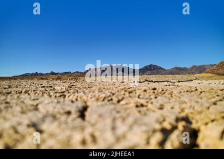 Old abandoned mines of Mazarron in Murcia on blue sky background during sunny summer day. Mineral extraction industry, history concept. Spain Stock Photo