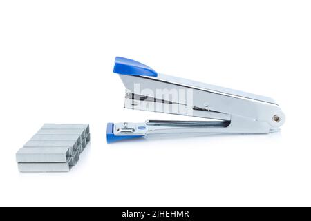 stapler steel color  blue and staples  isolated on white background Stock Photo