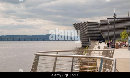 Dundee, Scotland, UK – June 23 2022. A view along the waterfront to the VA Centre and the distant River Tay rail bridge in Dundee Stock Photo