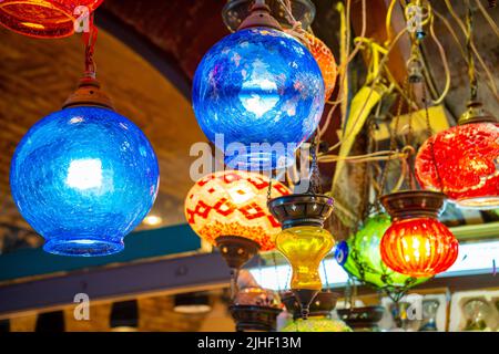 Traditional bright decorative Turkish lamps and colourful lights with vivid colours outdoors Stock Photo