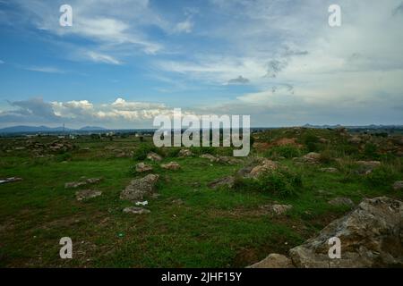 Greenland with blue sky with few rocks. Stock Photo