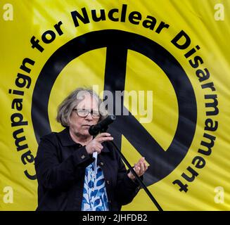 Lindsey German, founder of Stop the War speaking at protest by CND and Stop the War in Whitehall protesting against NATO and its policy towards Ukrain 2022. London 2022 Stock Photo