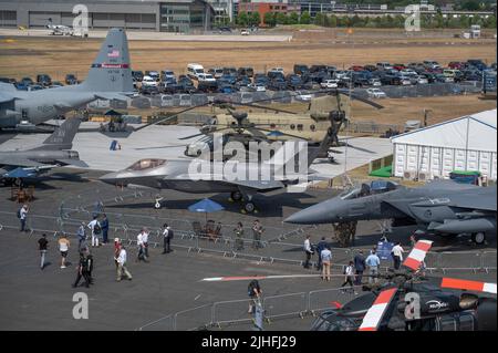 Farnborough, Hampshire, UK. 18 July 2022. The 2022 Farnborough International Trade Airshow opens at the height of the heatwave currently gripping the south of the UK with temperatures due to hit 40 degrees. Major aircraft manufacturers Airbus and Boeing compete for new sales at the Show which runs till 22 July. Credit: Malcolm Park/Alamy Live News Stock Photo
