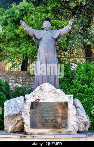 Statue of the Pope Emeritus Joseph Ratzinger near the Cathedral of San Panfilo, Sulmona, Italy Stock Photo