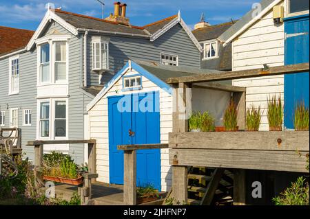 Beach houses on the seafront at Whitstable Bay, Kent, England Stock Photo
