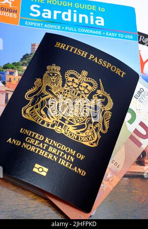 new british passport on travel guides Stock Photo
