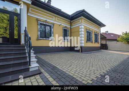 two-story concrete or brick country house Stock Photo