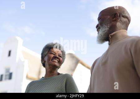 Image of happy african american senior couple in garden Stock Photo