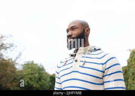 Image of african american man in garden Stock Photo