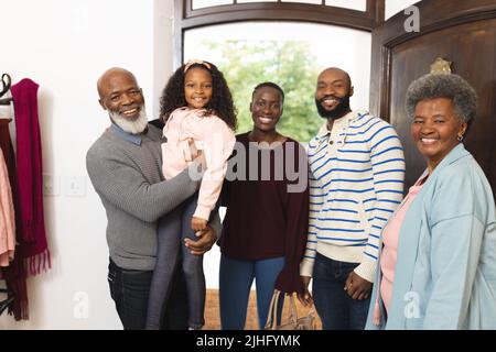 Image of happy multi generation african american posing in doors Stock Photo