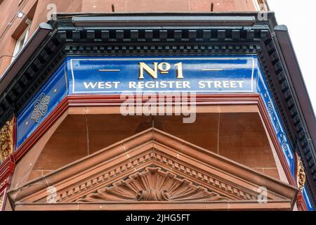 No.1 West Register Street sign painted on the side of a building in the city centre of Edinburgh, Scotland Stock Photo