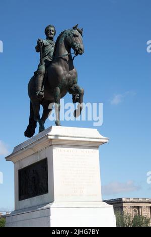 Henrici Magni bronze equestrian statue the King of France Henri IV in armor  on the Pont Neuf. the oldest standing bridge in Paris Paris France Stock Photo